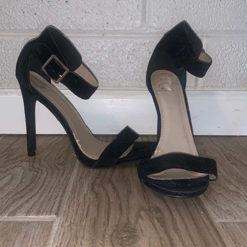 Black and gold stilettos